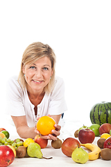 Image showing Fruits and blond cute woman