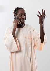 Image showing african man using smartphone