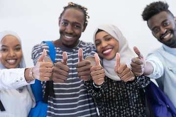 Image showing african students group showing ok thumbs up