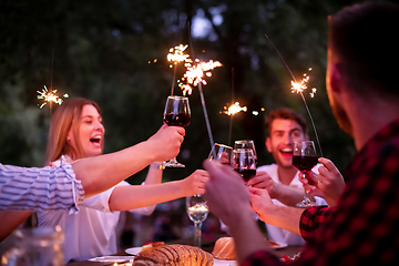 Image showing happy friends having french dinner party outdoor