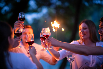 Image showing happy friends having french dinner party outdoor