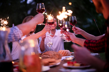 Image showing happy friends having french dinner party outdoor