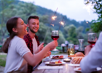 Image showing happy friends having french dinner party outdoor