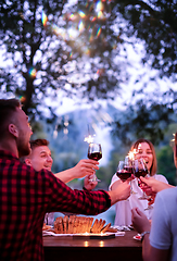 Image showing happy friends having french dinner party outdoor