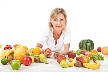 Image showing Fruits and blond cute woman