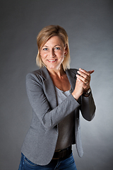 Image showing woman portrait clapping hands