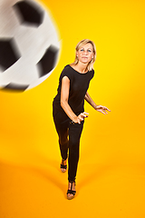 Image showing woman playing with a soccer ball