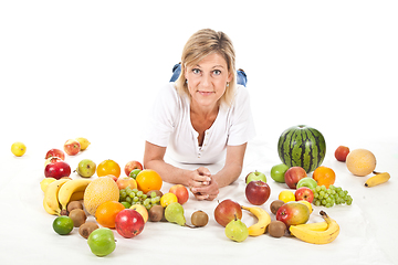 Image showing Fruits and blond cute woman