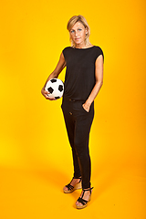 Image showing woman posing with a soccer ball