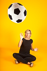 Image showing woman playing with a soccer ball