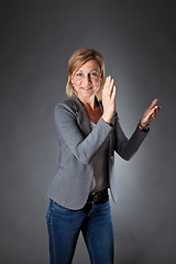 Image showing woman portrait clapping hands