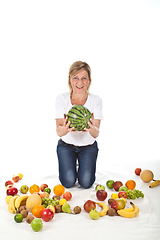 Image showing Fruits and blond cute woman