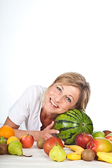 Image showing Fruits and blond cute woman