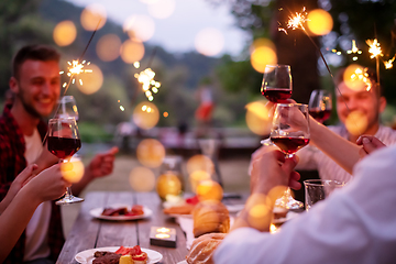 Image showing happy friends having french dinner party outdoor