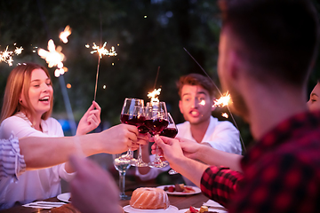 Image showing happy friends having french dinner party outdoor