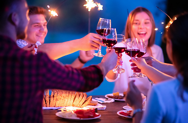 Image showing happy friends having french dinner party outdoor