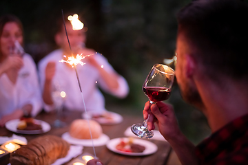 Image showing happy friends having french dinner party outdoor