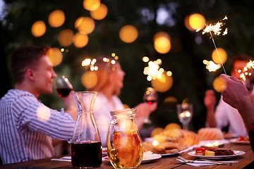 Image showing happy friends having french dinner party outdoor