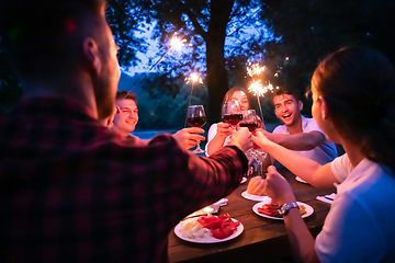 Image showing happy friends having french dinner party outdoor