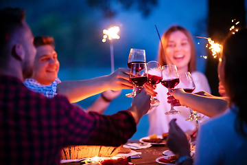 Image showing happy friends having french dinner party outdoor