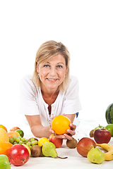 Image showing Fruits and blond cute woman