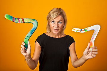 Image showing woman posing with a boomerang