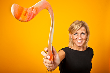 Image showing woman posing with a boomerang