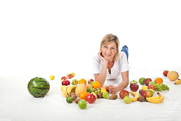 Image showing Fruits and blond cute woman