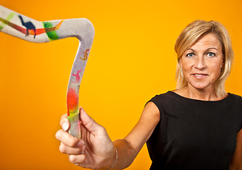 Image showing woman posing with a boomerang