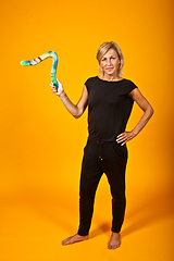 Image showing woman posing with a boomerang