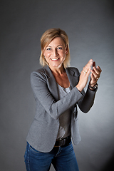 Image showing woman portrait clapping hands