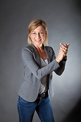 Image showing woman portrait clapping hands