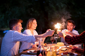 Image showing happy friends having french dinner party outdoor