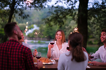 Image showing happy friends having french dinner party outdoor