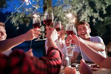 Image showing happy friends having french dinner party outdoor