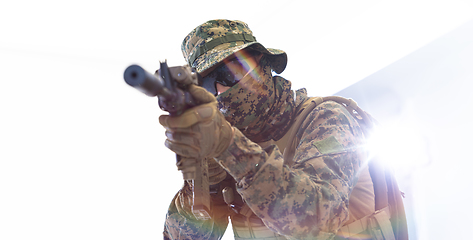 Image showing soldier aiming white background