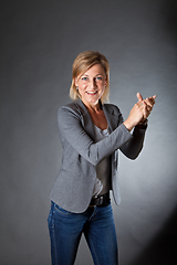 Image showing woman portrait clapping hands