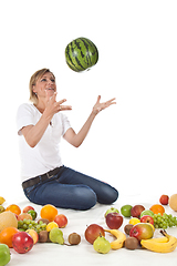 Image showing Fruits and blond cute woman