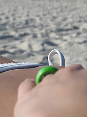 Image showing female in a white bikini on the beach