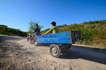 Image showing Mini tractor with passengers at dirt mountain road at Northern Moldova
