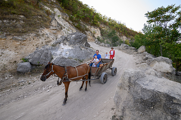 Image showing Traditional horse cart at dirt mountain road at Northern Moldova