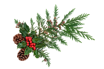 Image showing Winter Greenery with Holly Cedar Leaves and Pine Cones