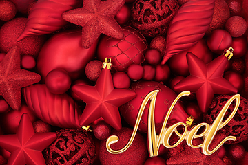 Image showing Gold Noel Sign and Red Bauble Background