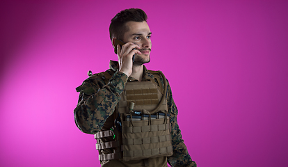 Image showing soldier using smartphone