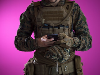 Image showing soldier using smartphone