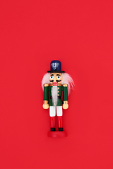 Image showing Nutcracker Toy Soldier on Red Background.