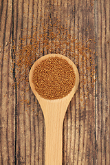 Image showing Camelina Seeds in a Wooden Spoon