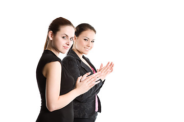 Image showing Two businesswomen clapping hands