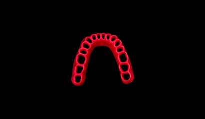 Image showing model of human gums without teeth isolated on black