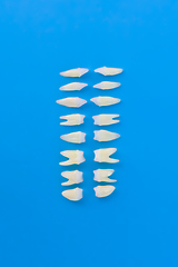 Image showing Top view of white teeth on blue background